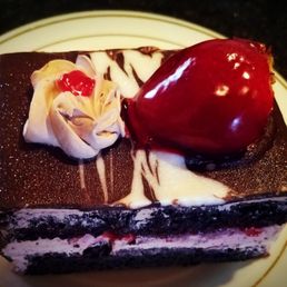 a piece of cake with a cherry on top a piece of cake with a cherry on top