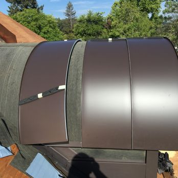 Titan Roofing And Construction - 12" panel radius with wall cladding - Roofing Near Me Titan Roofing And Construction - 12" panel radius with wall cladding - Roofing Near Me