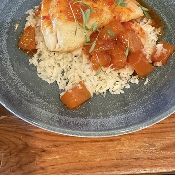 Zeke's Restaurant - Chilean Sea Bass over coconut rice with spicy pineapple sauce - Salad Near Me - Orange Beach, Alabama Zeke's Restaurant - Chilean Sea Bass over coconut rice with spicy pineapple sauce - Salad Near Me - Orange Beach, Alabama