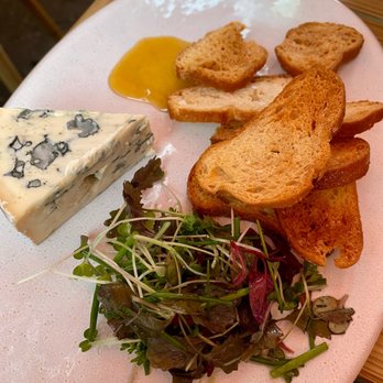 Blanchette - Fourme d'ambert (Cows' milk, tender blue cheese with a fruity heart, served with sarrasin honey) £7 - Bistros Near Me - London, XGL Blanchette - Fourme d'ambert (Cows' milk, tender blue cheese with a fruity heart, served with sarrasin honey) £7 - Bistros Near Me - London, XGL