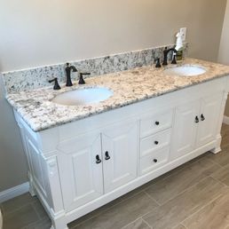 two sinks and a toilet