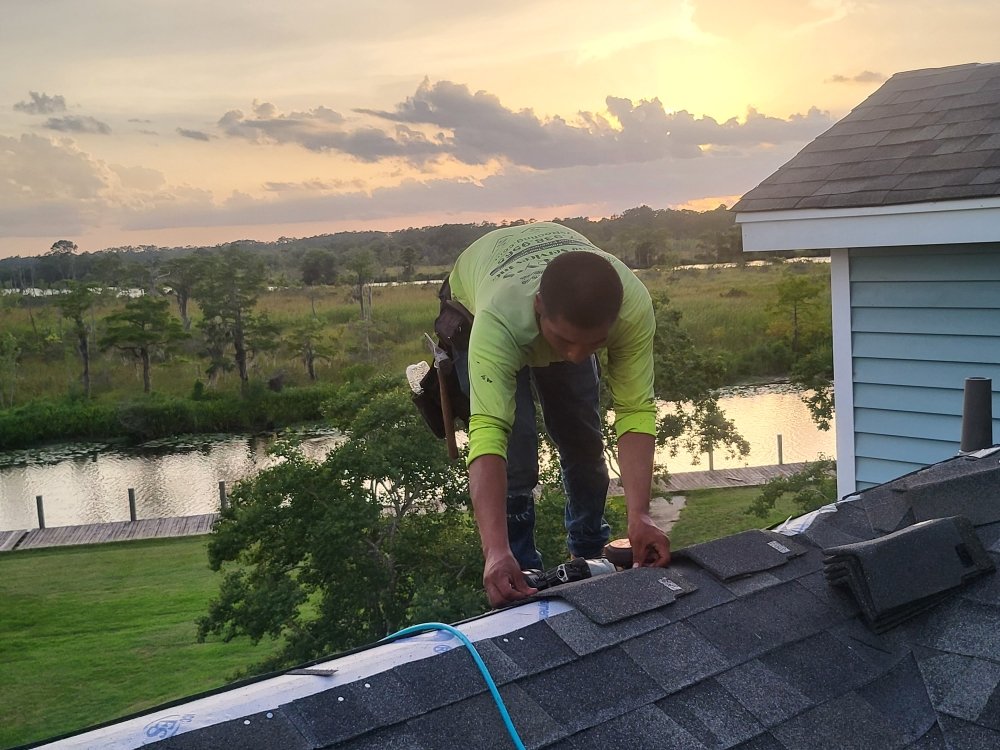 Slide of Anything & Everything Roofing