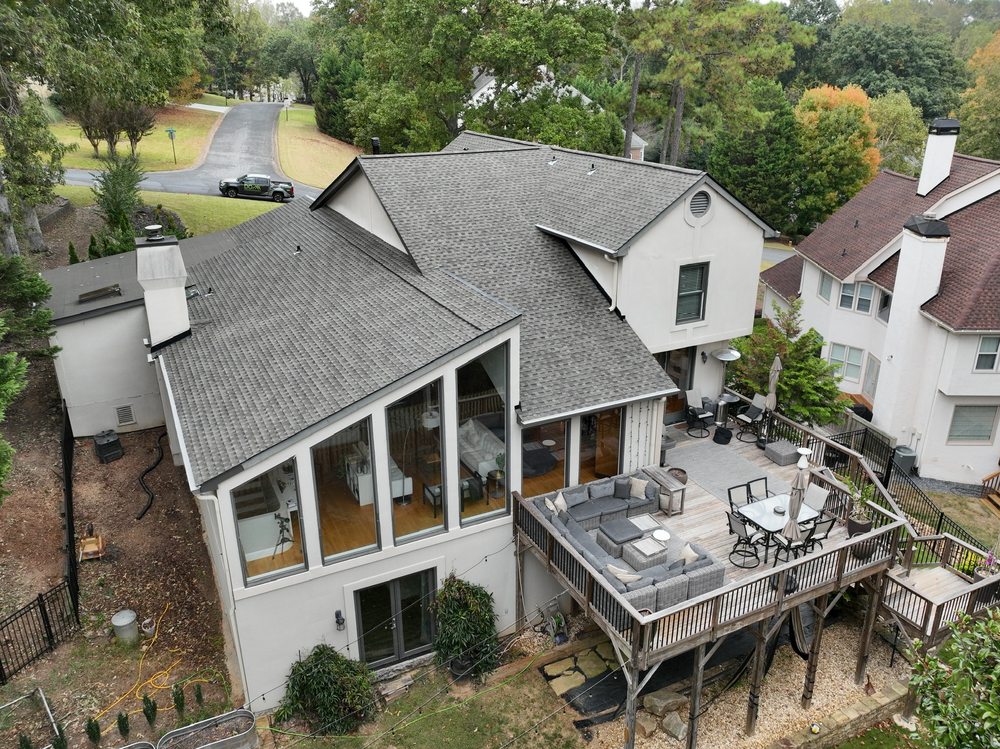 Slide of DOM Roofing & Restoration