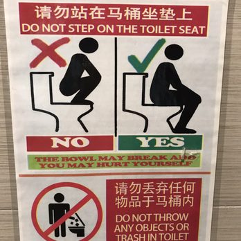 88 Food Connection - a do not step on the toilet seat sign - Food Court Near Me - Boston, Massachusetts