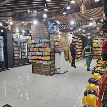 Organic Convenience - people shopping in a grocery store - Convenience Stores Near Me - New York, New York