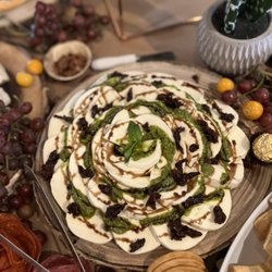 Third Space Coffee - Fresh Mozzarella with pesto, sundried tomato's, and balsamic glaze. Part of the Third Space Grazing Table