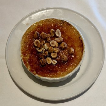 Cole's Chop House - Amaretto Crème Brûlée garnished with candied hazelnuts from Cole's Chop House - Steakhouses Near Me - Napa, California
