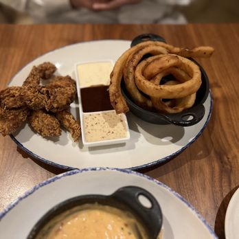 Tupelo Honey Southern Kitchen & Bar - Buttermilk Fried Chicken Tenders, Beer Battered Onion Rings - Southern Near Me - Franklin, Tennessee Tupelo Honey Southern Kitchen & Bar - Buttermilk Fried Chicken Tenders, Beer Battered Onion Rings - Southern Near Me - Franklin, Tennessee