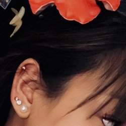 Villain's Inc - Third lobe and helix piercing by Bri