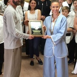 9 Dragons Kung Fu - This was awesome!!! Receiving a plaque by the student body for 10 years of helping g other in the arts of Kung Fu and Tai Chi.