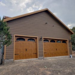 Doubler Door Works - CLOPAY gallery line doors in medium oak ultra grain.
