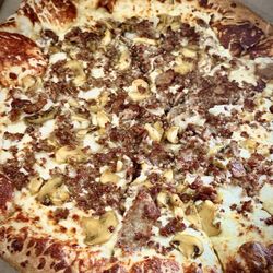 Gianni's Pizza & Wings - Philadelphia Cheesesteak pizza with garlic white sauce (steak, onions and mushrooms). Next time I'll also add green peppers.