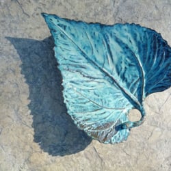 Sunflower Leaf serving tray is approx. 12" long x 10" wide