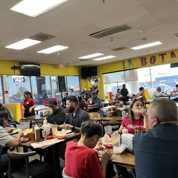 La Botana - a large group of people eating in a restaurant - Seafood Near Me - Phoenix, Arizona