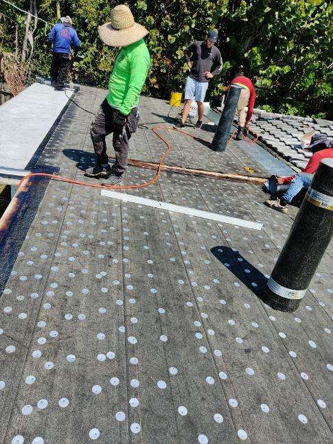 Slide of Tropical Roofing Services