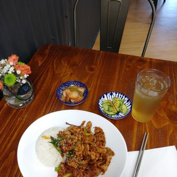 Sue's Korean Kitchen - Spicy pork bulgogi in a pretty table setting. - Korean Near Me - Stratham, New Hampshire
