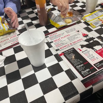 G BRAND BBQ - Using our chips to try out the array of sauces they offer. - Barbeque Near Me - Crawford, Georgia