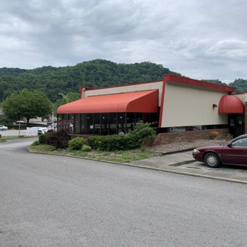 Rax - a red car parked in front of the restaurant - Burgers Near Me - Harlan, Kentucky Rax - a red car parked in front of the restaurant - Burgers Near Me - Harlan, Kentucky