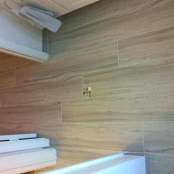 My Artistic Tile - tile floor (looks like wood) with designer tiles inserted - in dressing area - Tiling Near Me - Oxnard, California