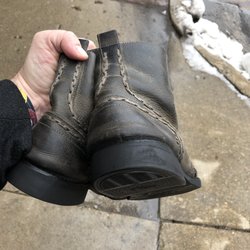 Genco Boot Shop - A pair of expertly repaired boots.