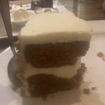 Chester's Kitchen and Bar - This is seriously the biggest slice of carrot cake I've ever ordered and I have ordered a lot of carrot cakes! - New American Near Me - Rochester, Minnesota