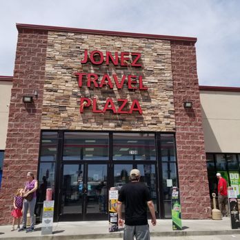 Jones Travel Mart - a man walking in front of jones travel plaza - Convenience Stores Near Me - Cameron, Missouri Jones Travel Mart - a man walking in front of jones travel plaza - Convenience Stores Near Me - Cameron, Missouri