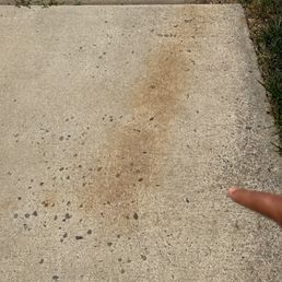 Rust mark left in driveway by Ram's container. Rust mark left in driveway by Ram's container.