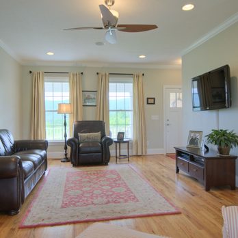 Vision Flooring - a living room with a ceiling fan - Flooring Near Me Vision Flooring - a living room with a ceiling fan - Flooring Near Me