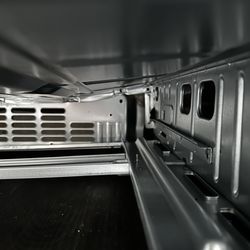 The Home Depot - Dent in the lower drawer of my new range.