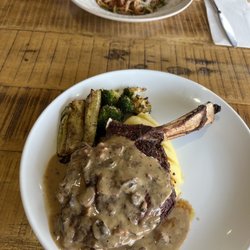 Osteria Da Gino - Prime rib with the mushroom cream sauce, paired with mashed potatoes and grilled vegetables. Beef bolognese pasta in the back.
