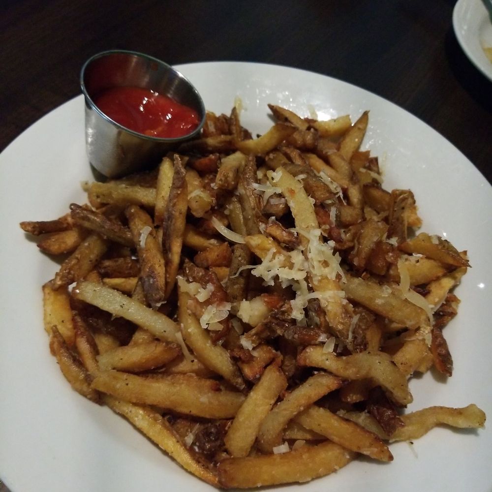 Crush - Truffle Fries. Omg sooo good!!! The initial presentation was much better... we'd just started munching already. - New American Near Me - Amarillo, Texas