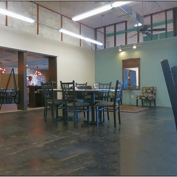 Nia's Towne Square Restaurant - This in the brightly lighted, high ceiling room where we ate.  You can see the older area through the double doors. That's were I would eat. - American Near Me - Bay City, Texas
