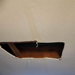 Family lawn Services - Finding another leak where the plumber hadn't opened the ceiling before.