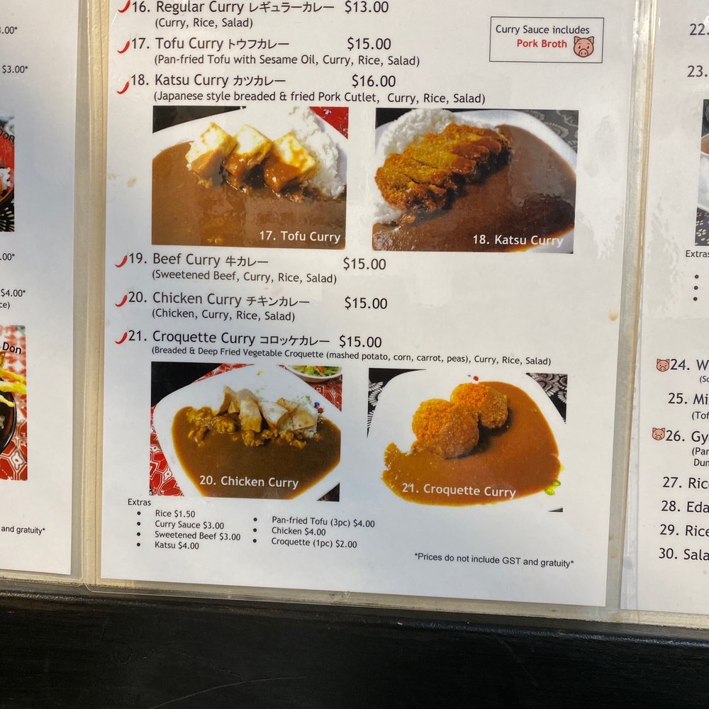 Chaya - a menu of curry dishes on a white board - Ramen Near Me - Banff, Alberta