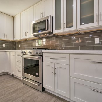 Venus Homes - a kitchen with white cabinets and stainless steel appliances - General Contractors Near Me - Gilbert, Arizona Venus Homes - a kitchen with white cabinets and stainless steel appliances - General Contractors Near Me - Gilbert, Arizona