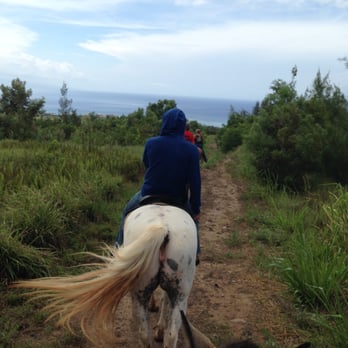 Ironwood Ranch - My view from horseback, boyfriend ahead, Molokini in the distance.  I'm on Kona, He's on Lady Gaga; both were absolute dolls! - Horseback Riding Near Me - Lahaina, Hawaii