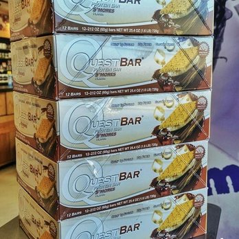 Nutrition Zone - a stack of quest bar bars - Vitamins & Supplements Near Me - Lubbock, Texas