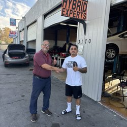 Hybrid Experts - Mr. Faraj on the left, one happy customer on the right.