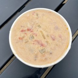 Connecticut Clam Chowder (made with clams, smoked bacon, veggies, and tomatoes in a pink creamy broth)
