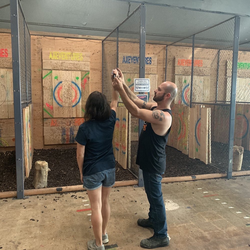 AxeVentures - Getting some help! - Axe Throwing Near Me - San Diego, California AxeVentures - Getting some help! - Axe Throwing Near Me - San Diego, California