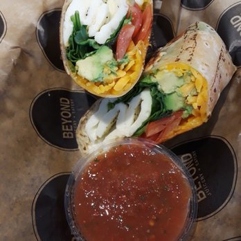 Beyond Juicery + Eatery - The Original wrap with added spinach. The sauce to top it with was mild. Fantastic wrap, wrapped tightly so no bits fell out. - Juice Bars & Smoothies Near Me - Clarkston, Michigan
