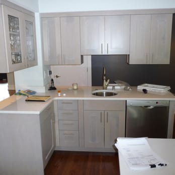 Dream Homes Remodeling - a kitchen with white cabinets - General Contractors Near Me - Puyallup, Washington Dream Homes Remodeling - a kitchen with white cabinets - General Contractors Near Me - Puyallup, Washington