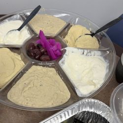 Pita Gourmet - The dips of the Mediterranean Tour - tzatziki, hummus, and baba ghanouj with pickled turnips and Kalamata olives