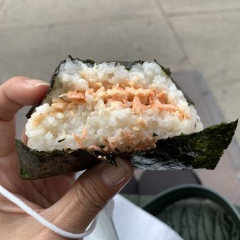 Juju Cafe and Deli - a hand holding a piece of sushi - Cafes Near Me - Brooklyn, New York Juju Cafe and Deli - a hand holding a piece of sushi - Cafes Near Me - Brooklyn, New York