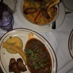 The duo flick Arroz con Pollo and Ox-Tail