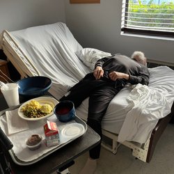 Menorah House - My dad laying in bed not being able to get up, food left in front of him! This is an Alzheimer's patient