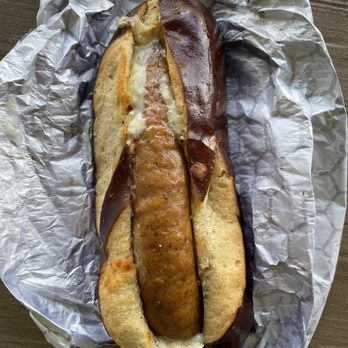 Edelweiss Snacks - Fantasyland Garlic Cheesy Brat (TikTok: @justandyvu) - Food Stands Near Me - Anaheim, California Edelweiss Snacks - Fantasyland Garlic Cheesy Brat (TikTok: @justandyvu) - Food Stands Near Me - Anaheim, California