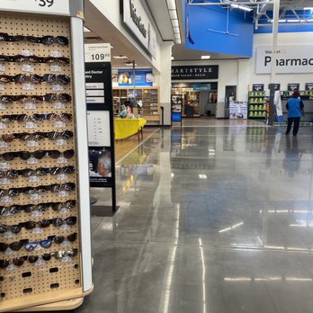 Walmart Supercenter - a large display of sunglasses - Department Stores Near Me - Lapeer, Michigan
