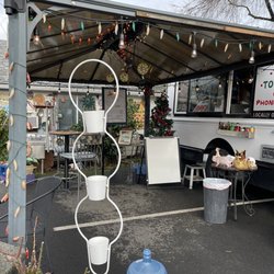 Ricky's Taco Truck - Covered seating area and some tables not covered