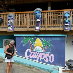 Caddys Calypso - Sister in law in front restaurant sign